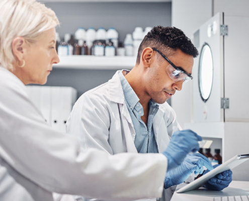 Science team, tablet and analysis study in lab for pharmaceutical collaboration